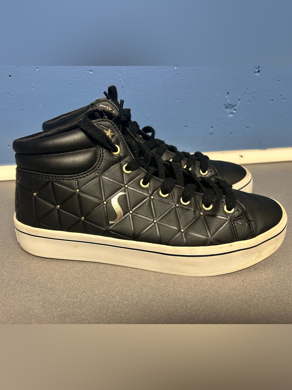 Skechers Black Quilted High-Top Sneakers with Gold Accents